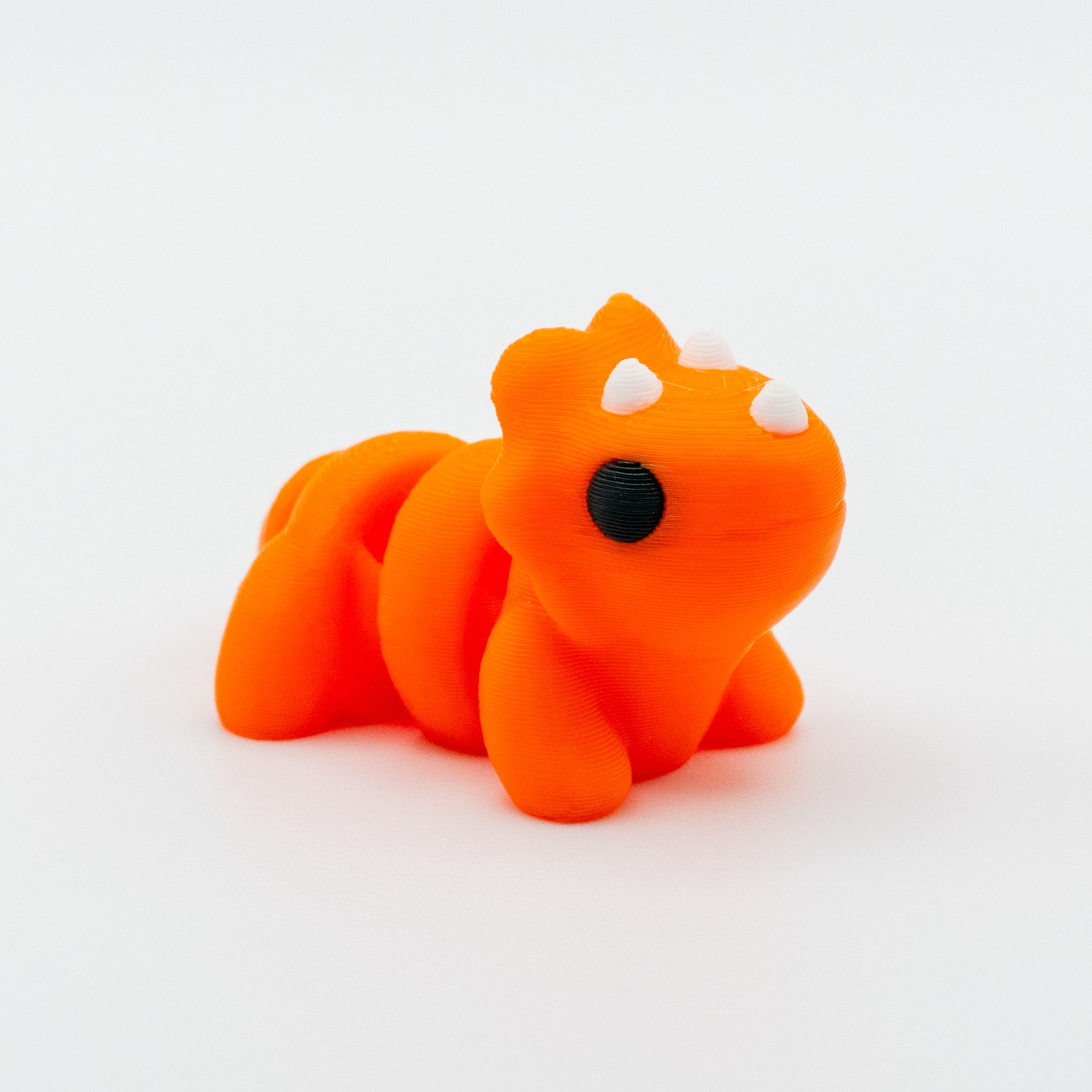 Emberhorn the Playful Triceratops
