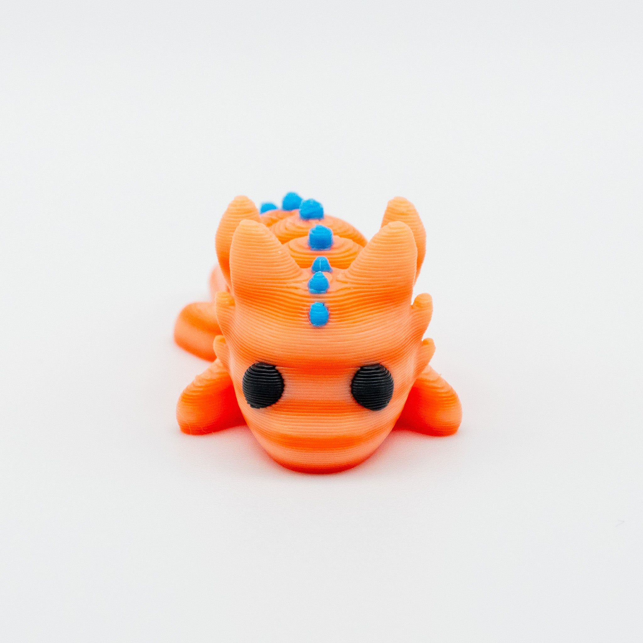 🐉✨ Blinky Scales – The Wiggly Baby Dragon